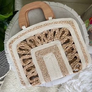 Woven Clutch with wooden handles by Shiraleah